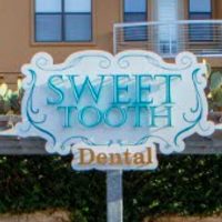 Logo for Sweet Tooth Dental Austin